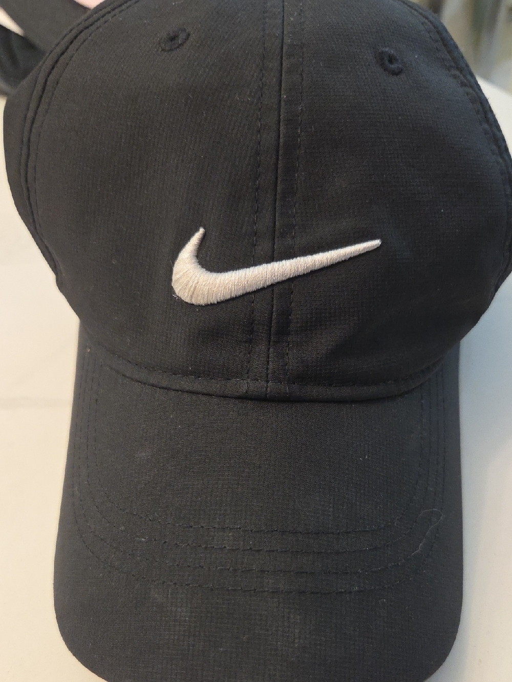 Nike Black Cap with White Swoosh Logo